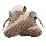 Botte d’hiver pour enfant beige et brun, avec doublure en laine chaude et lacets ajustables.