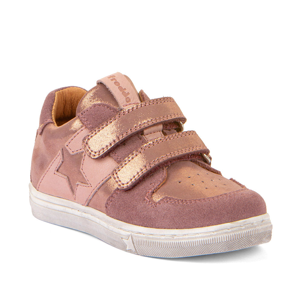 Basket pour enfants en bi-matière rose argentée, avec une étoile sur le côté, une semelle blanche et des attaches velcros.
