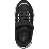 Sneakers imperméables pour enfant, de couleur noire.