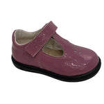 Ballerine rose avec velcro, semelle noire et jolis détails fleuris sur l’avant du pied.