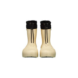 Botte d'hiver Fubuki pour les enfants, dans la couleur beige avec une sangle noire au-dessus pour ajuster la largeur au mollet.