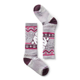 Chausette Smartwool mauve avec un ours polaire, confortable, idéale pour le ski et les sports d'hiver.