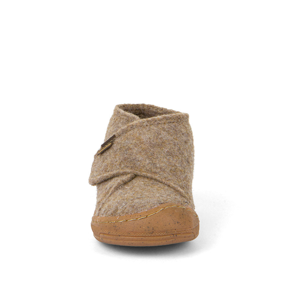 Chausson bébé premiers pas Froddo en laine beige, avec semelle souple antidérapante, bout renforcé et fermeture velcro.