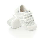 Paire de chaussure rayée couleur vert sauge et blanche à velcro idéale pour enfants