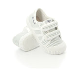 Paire de chaussure rayée couleur vert sauge et blanche à velcro idéale pour enfants