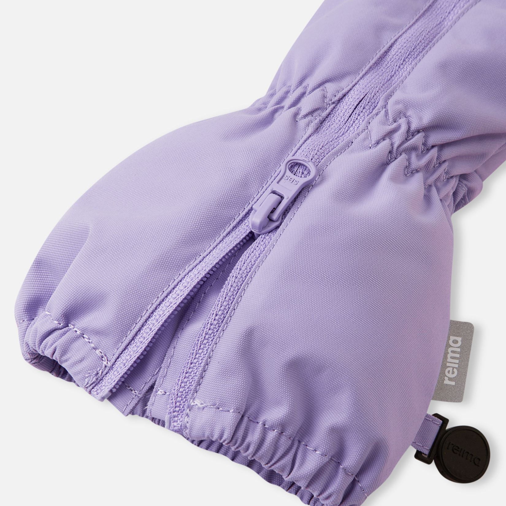 Mitaines lilas avec fermeture éclair et poignets ajustables