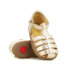 Sandale pour bébé en cuir métallisé doré. 
