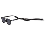 Sangle en tissu noir pour les lunettes Babiators pour enfants, s'attache à l'arrière des lunettes pour les garder bien en place.