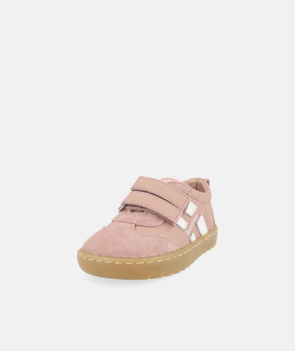chaussure rose avec bandes blanches, inscription Blanditos sur le côté et semelle épaisse brune