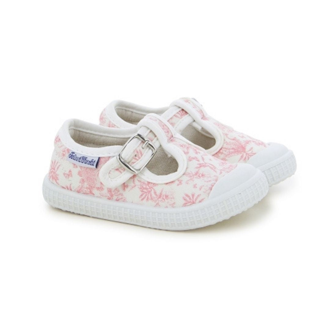 Chaussures pour enfant de couleur rose. Fermeture type boucle.