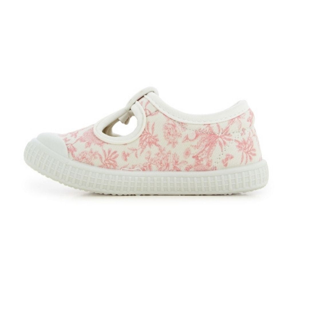 Chaussure en toile rose et blanche. 