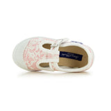Chaussure pour fille en toile de couleur rose. Boucle sur le côté.